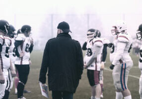coach with young players