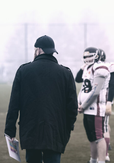coach with young players